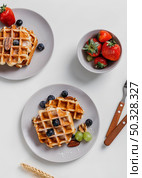 composition tasty breakfast waffles. High resolution photo. composition tasty breakfast waffles. High quality photo. Стоковое фото, агентство Ingram Publishing / Фотобанк Лори