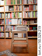 books lying ladder bookstore. High resolution photo. books lying ladder bookstore. High quality photo. Стоковое фото, агентство Ingram Publishing / Фотобанк Лори