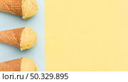 ice cream cones different color background. High resolution photo. ice cream cones different color background. High quality photo. Стоковое фото, агентство Ingram Publishing / Фотобанк Лори