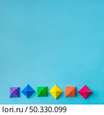 row bright paper origami. High resolution photo. row bright paper origami. High quality photo. Стоковое фото, агентство Ingram Publishing / Фотобанк Лори