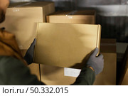 delivery man with packages. High resolution photo. delivery man with packages. High quality photo. Стоковое фото, агентство Ingram Publishing / Фотобанк Лори