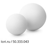 Perfect white balls isolated on white. Two white balls. Стоковое фото, агентство Ingram Publishing / Фотобанк Лори