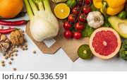 flat lay assortment vegetables with paper bag copy space. Стоковое фото, агентство Ingram Publishing / Фотобанк Лори