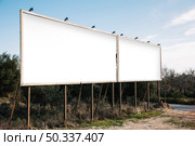 empty white billboards suburban roadside. Стоковое фото, агентство Ingram Publishing / Фотобанк Лори
