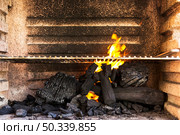 empty bbq grill pit with hot charcoal briquettes. Стоковое фото, агентство Ingram Publishing / Фотобанк Лори