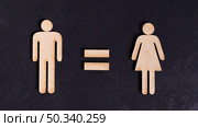 man woman equal rights black background. Стоковое фото, агентство Ingram Publishing / Фотобанк Лори