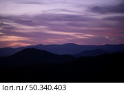 pink clouded sky with mountains. Стоковое фото, агентство Ingram Publishing / Фотобанк Лори