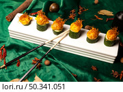 Delicious Asian Fusion Cuisine Featuring Cucumber Rolls With Chopsticks. Стоковое фото, фотограф Aleksandr Golubev / Фотобанк Лори