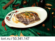 Steamed Flounder Dish With Vegetable Garnish on a Patterned Plate at a Chinese Restaurant. Стоковое фото, фотограф Aleksandr Golubev / Фотобанк Лори