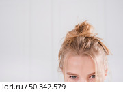 blonde girl with messy bun. Стоковое фото, агентство Ingram Publishing / Фотобанк Лори