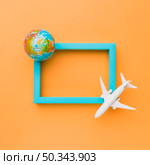 blue frame with plane globe. Стоковое фото, агентство Ingram Publishing / Фотобанк Лори