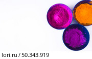 bowls holi color powder white background. Стоковое фото, агентство Ingram Publishing / Фотобанк Лори