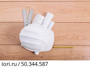 helmet drafts rulers. Стоковое фото, агентство Ingram Publishing / Фотобанк Лори