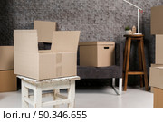 variety cardboard boxes ready be moved. Стоковое фото, агентство Ingram Publishing / Фотобанк Лори