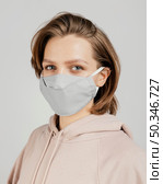 woman hoodie with mask. Стоковое фото, агентство Ingram Publishing / Фотобанк Лори