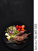 delicious arabic fast food meat skewers. Стоковое фото, агентство Ingram Publishing / Фотобанк Лори
