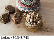 ramadan concept with pistachios. Стоковое фото, агентство Ingram Publishing / Фотобанк Лори