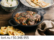 tasty pakistani dishhigh angle. Стоковое фото, агентство Ingram Publishing / Фотобанк Лори