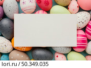 top view colorful easter eggs with paper. Стоковое фото, агентство Ingram Publishing / Фотобанк Лори