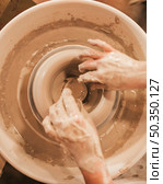 hands woman process making clay bowl pottery wheel. Стоковое фото, агентство Ingram Publishing / Фотобанк Лори