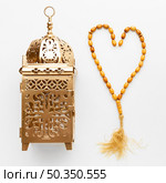 top view islamic new year concept with misbaha. Стоковое фото, агентство Ingram Publishing / Фотобанк Лори