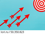arrows pointing dartboard center. Стоковое фото, агентство Ingram Publishing / Фотобанк Лори