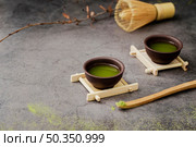 close up matcha tea cups with copy space. Стоковое фото, агентство Ingram Publishing / Фотобанк Лори