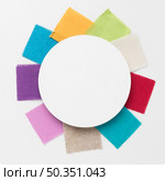 colorful pieces cloths arrangement with white circle centered. Стоковое фото, агентство Ingram Publishing / Фотобанк Лори