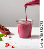 delicious fruit smoothie with pomegranate. Стоковое фото, агентство Ingram Publishing / Фотобанк Лори