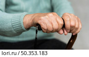 older woman holding cane hands. Стоковое фото, агентство Ingram Publishing / Фотобанк Лори