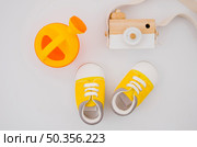 flat lay baby shoes with white background. Стоковое фото, агентство Ingram Publishing / Фотобанк Лори