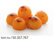 Traditional Portuguese conventual sweet called Castanha De Ovo from Alcobaca, Portugal. Isolated on white background. Стоковое фото, агентство Ingram Publishing / Фотобанк Лори