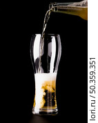 beer glass being filled. Стоковое фото, агентство Ingram Publishing / Фотобанк Лори
