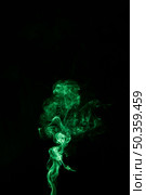 bright green twirling smoke movement black background with copy space writing text. Стоковое фото, агентство Ingram Publishing / Фотобанк Лори