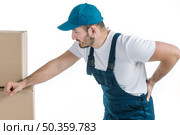 courier with aching back. Стоковое фото, агентство Ingram Publishing / Фотобанк Лори