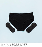 top view knickers with sanitary towels. Стоковое фото, агентство Ingram Publishing / Фотобанк Лори