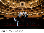 two mime artist performing stage empty auditorium. Стоковое фото, агентство Ingram Publishing / Фотобанк Лори