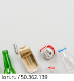 different recyclable waste white background. Стоковое фото, агентство Ingram Publishing / Фотобанк Лори