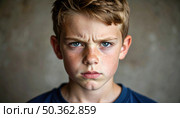 Angry child with furrowed brows expressing strong emotion, concept of childhood frustration, mood, behavior, or discipline challenge. Стоковое AI-изображение, AI-художник Igor Tichonow / Фотобанк Лори