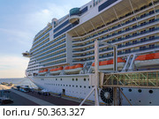 Tokyo, Japan - Oct 2 2024, Panoramic side view of the cruise ship MSC Belissima, view from the cruise terminal of the port of Tokyo, during daytime, without people, Tokyo, Japan. Редакционное фото, фотограф Сергей Богомяко / Фотобанк Лори