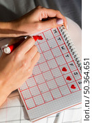 high view menstruation calendar with hearts. Стоковое фото, агентство Ingram Publishing / Фотобанк Лори