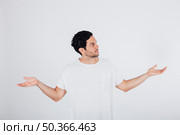 man making i dont know gesture. Стоковое фото, агентство Ingram Publishing / Фотобанк Лори