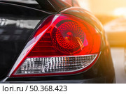 rear light new dark car. Стоковое фото, агентство Ingram Publishing / Фотобанк Лори