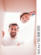 curious couple inside bottom box view. Стоковое фото, агентство Ingram Publishing / Фотобанк Лори
