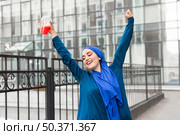 happy girl wearing hijab. Стоковое фото, агентство Ingram Publishing / Фотобанк Лори