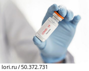 close up doctor holding vaccine recipient her hand . Стоковое фото, агентство Ingram Publishing / Фотобанк Лори