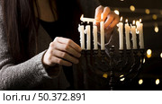 front view of hanukkah candle holder concept. Стоковое фото, агентство Ingram Publishing / Фотобанк Лори