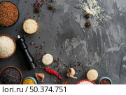 raw ingredients variety rice arranged rough concrete surface. Стоковое фото, агентство Ingram Publishing / Фотобанк Лори