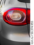 stylish rear light new silver car. Стоковое фото, агентство Ingram Publishing / Фотобанк Лори