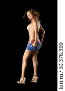 Beautiful sexy woman isolated on black background. Стоковое фото, агентство Ingram Publishing / Фотобанк Лори